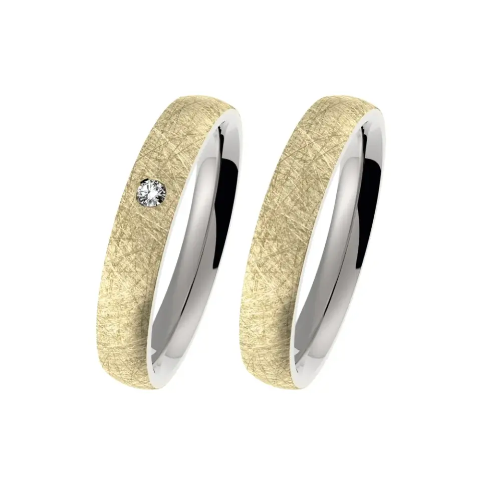 Alianzas de boda de acero y oro amarillo con diamante