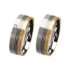Alianzas de boda de acero y oro amarillo con diamante