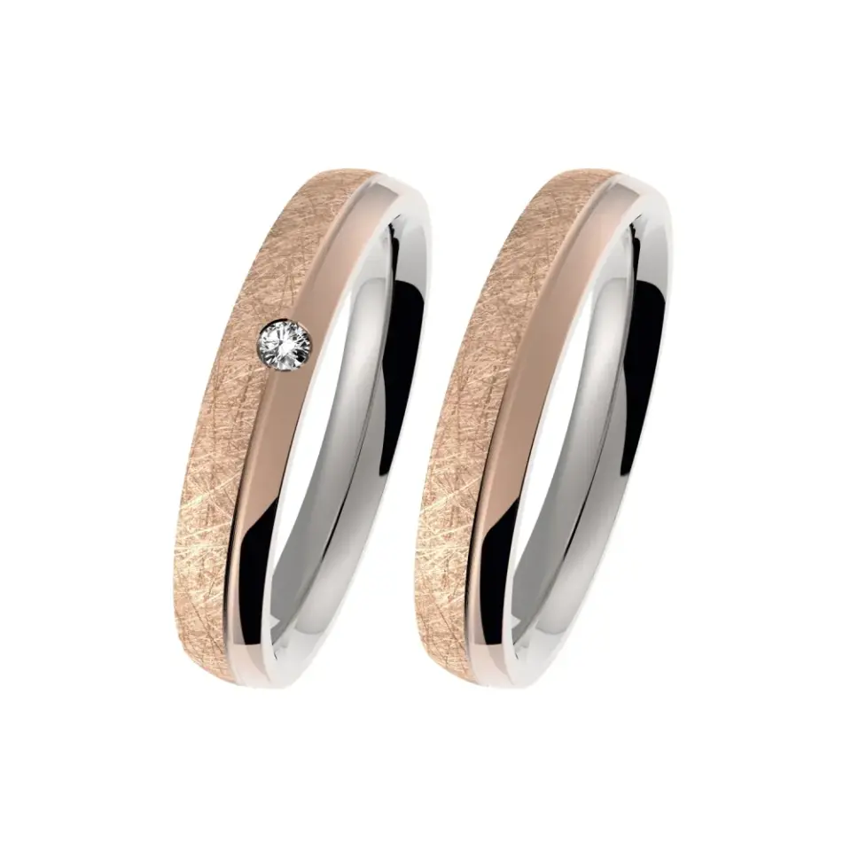 Alianzas de boda de acero y oro rosado con diamante