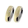 Alianzas de boda de acero y oro amarillo con diamante