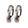 Alianzas de boda de acero y oro rosado con diamante