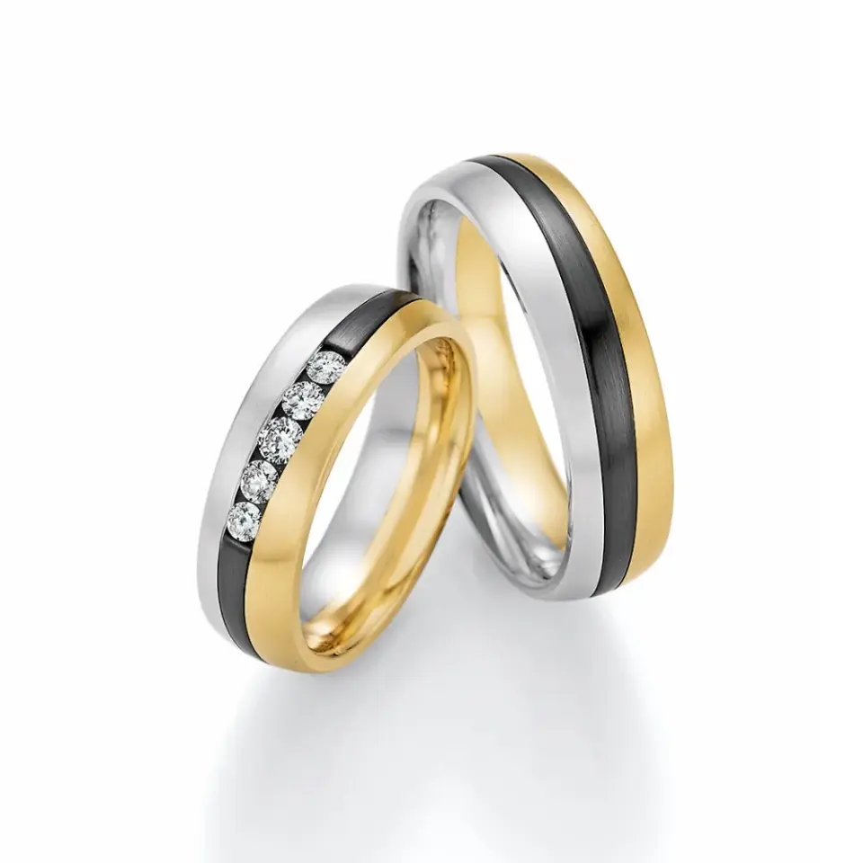 Alianzas de boda de oro amarillo y zirconio con diamantes