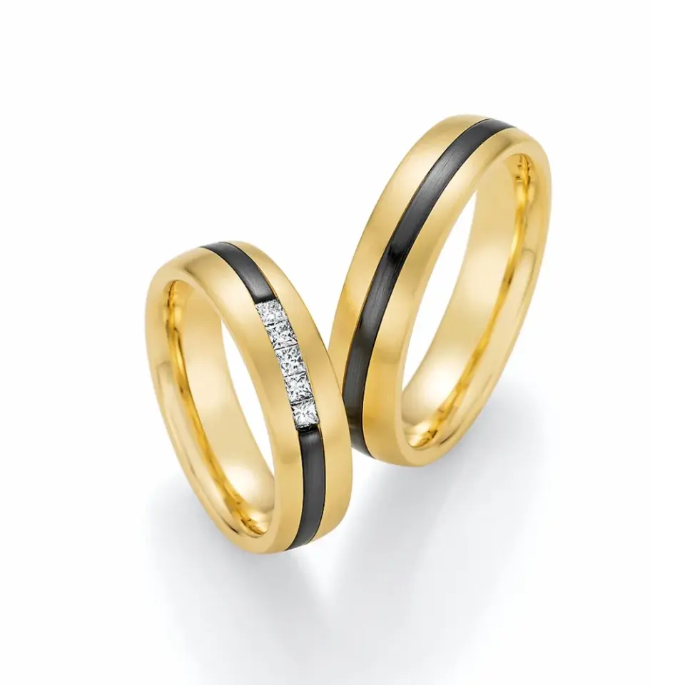 Alianzas de boda de oro amarillo y zirconio con diamantes