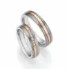 Alianzas de boda de titanio y oro rosado con diamantes