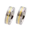 Alianzas de boda de acero y oro amarillo con diamante