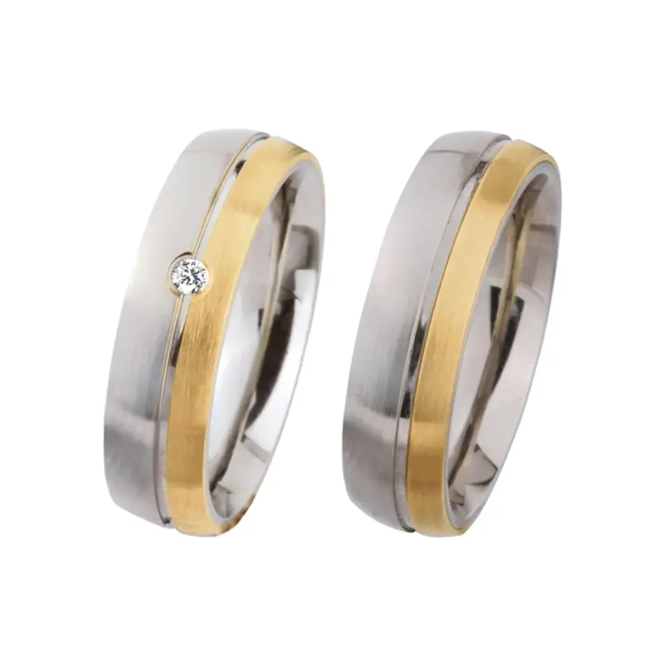 Alianzas de boda de acero y oro amarillo con diamante