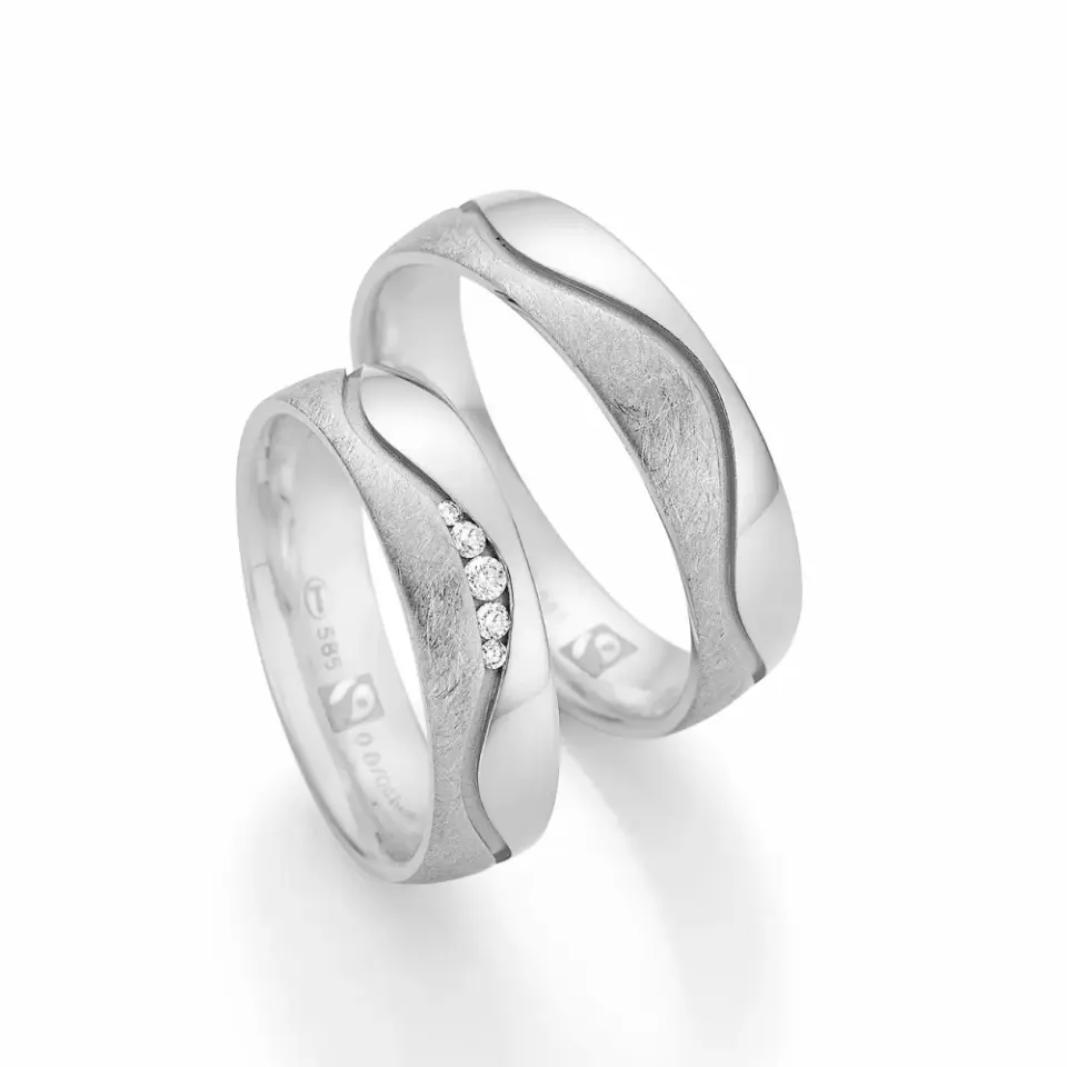 Alianzas de boda de oro blanco con diamantes