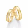Alianzas de boda de oro amarillo con diamantes