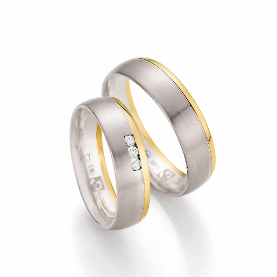 Alianzas de boda de oro blanco y oro amarillo con diamantes