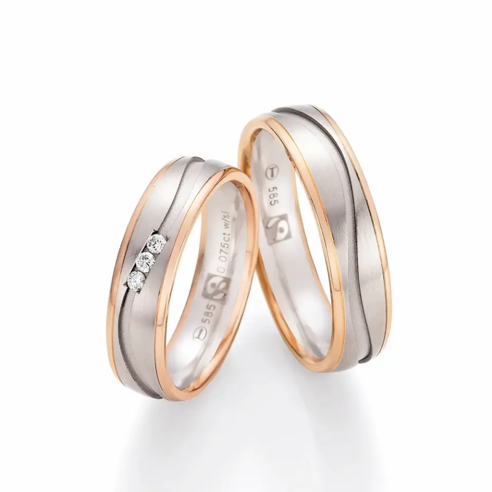 Alianzas de boda de oro rosado y oro blanco con diamantes