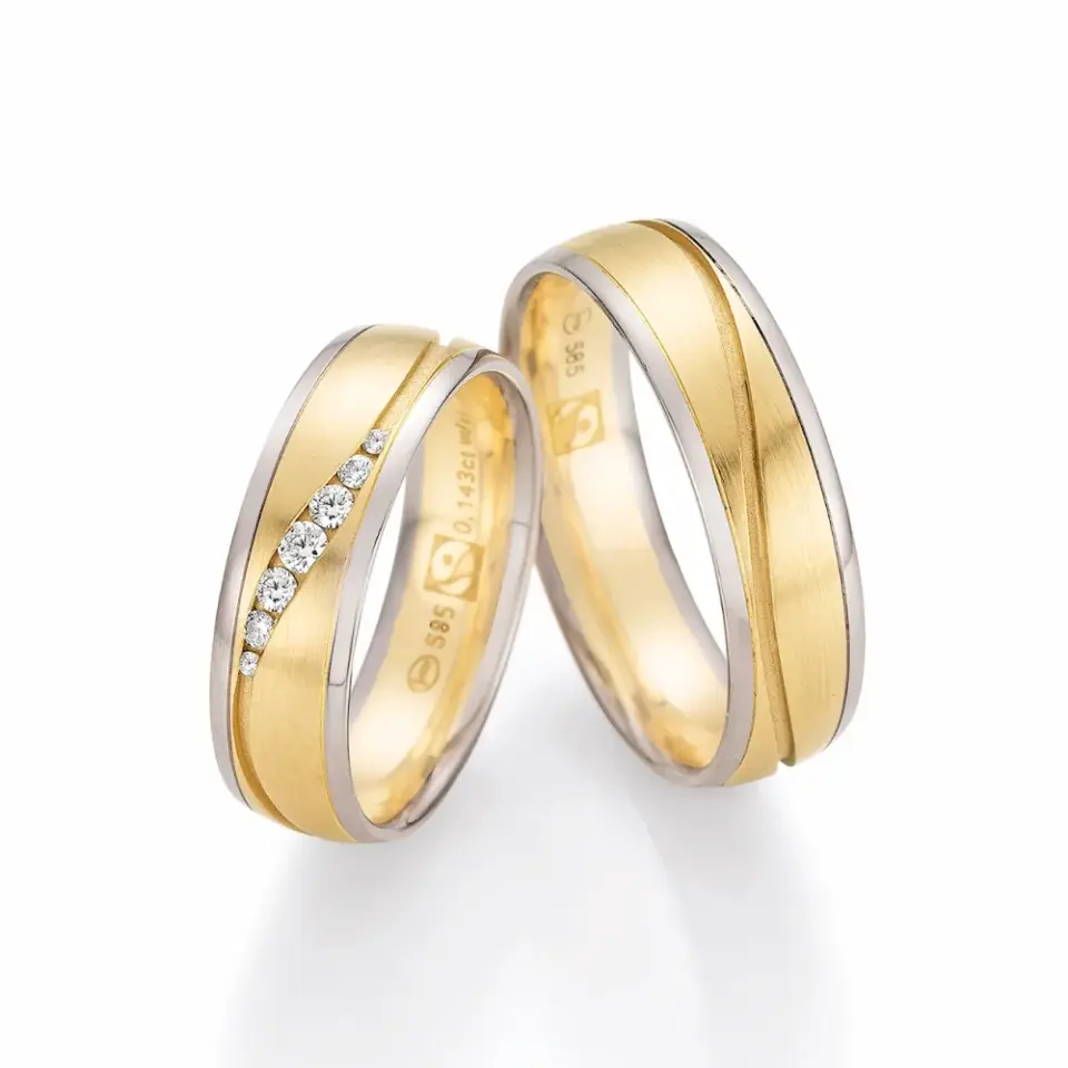 Alianzas de boda de oro blanco y oro amarillo con diamantes