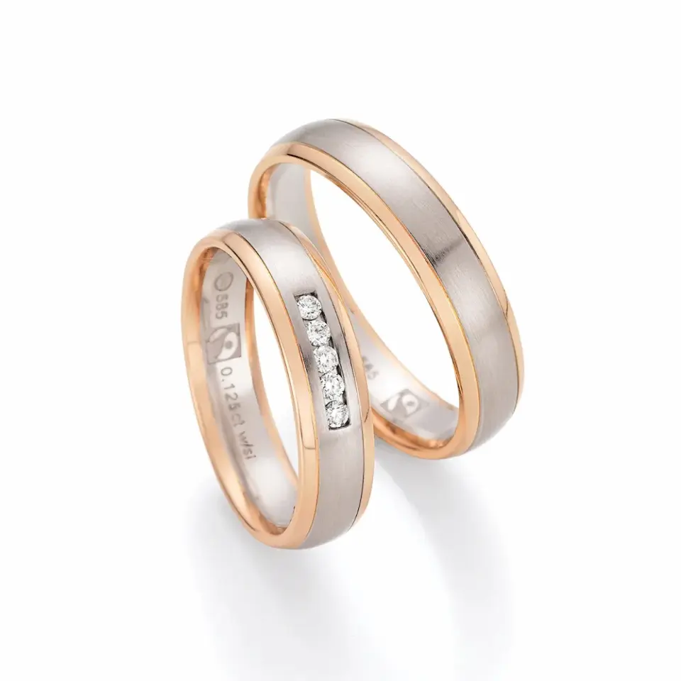 Alianzas de boda de oro rosado y oro blanco con diamantes