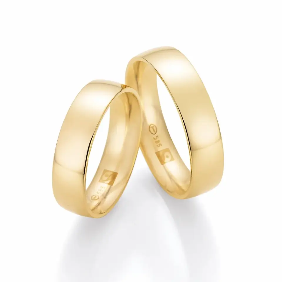 Alianzas de boda de oro amarillo