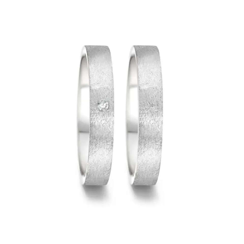 Alianzas de boda de acero con diamante