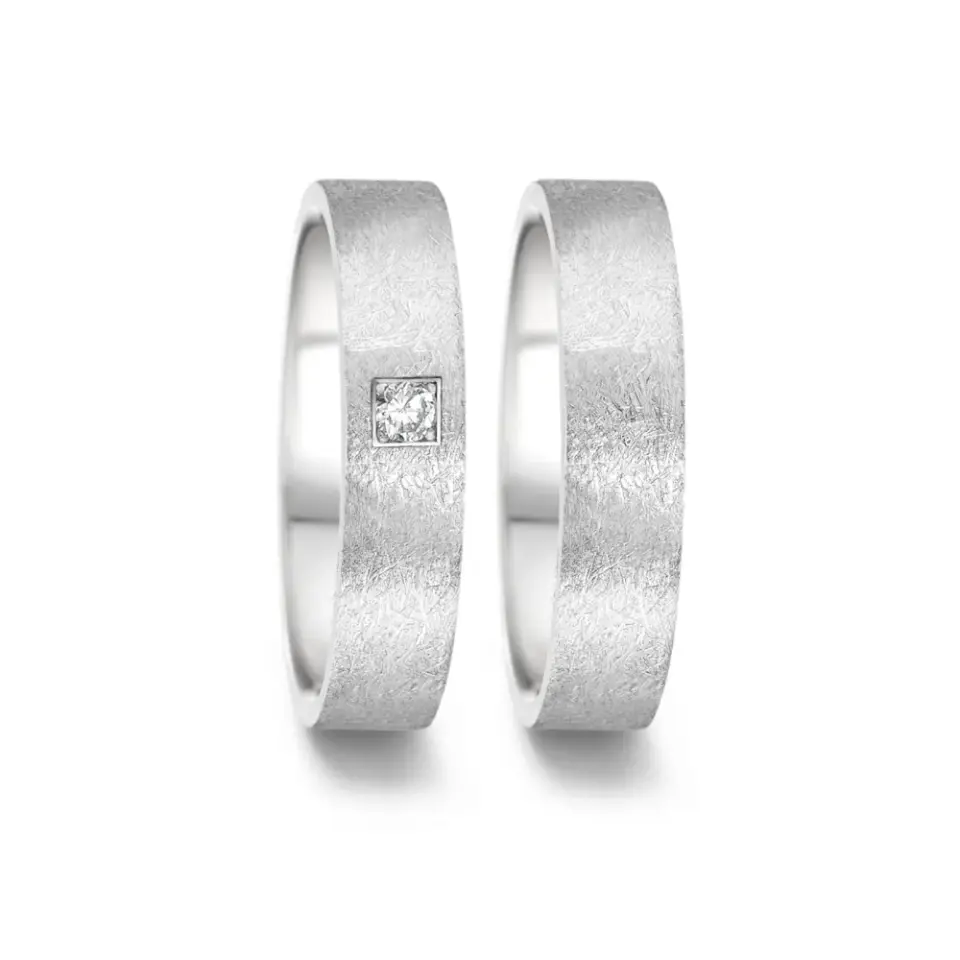Alianzas de boda de acero con diamante