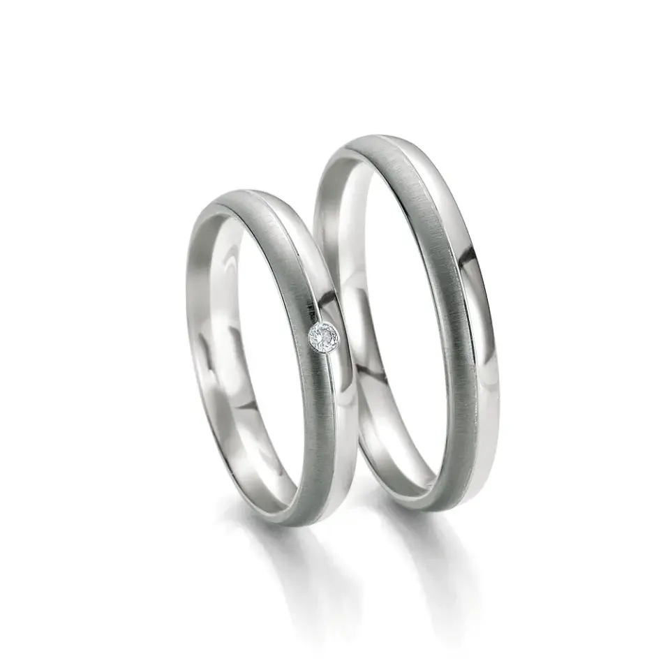 Alianzas de boda de oro blanco y oro gris con diamante