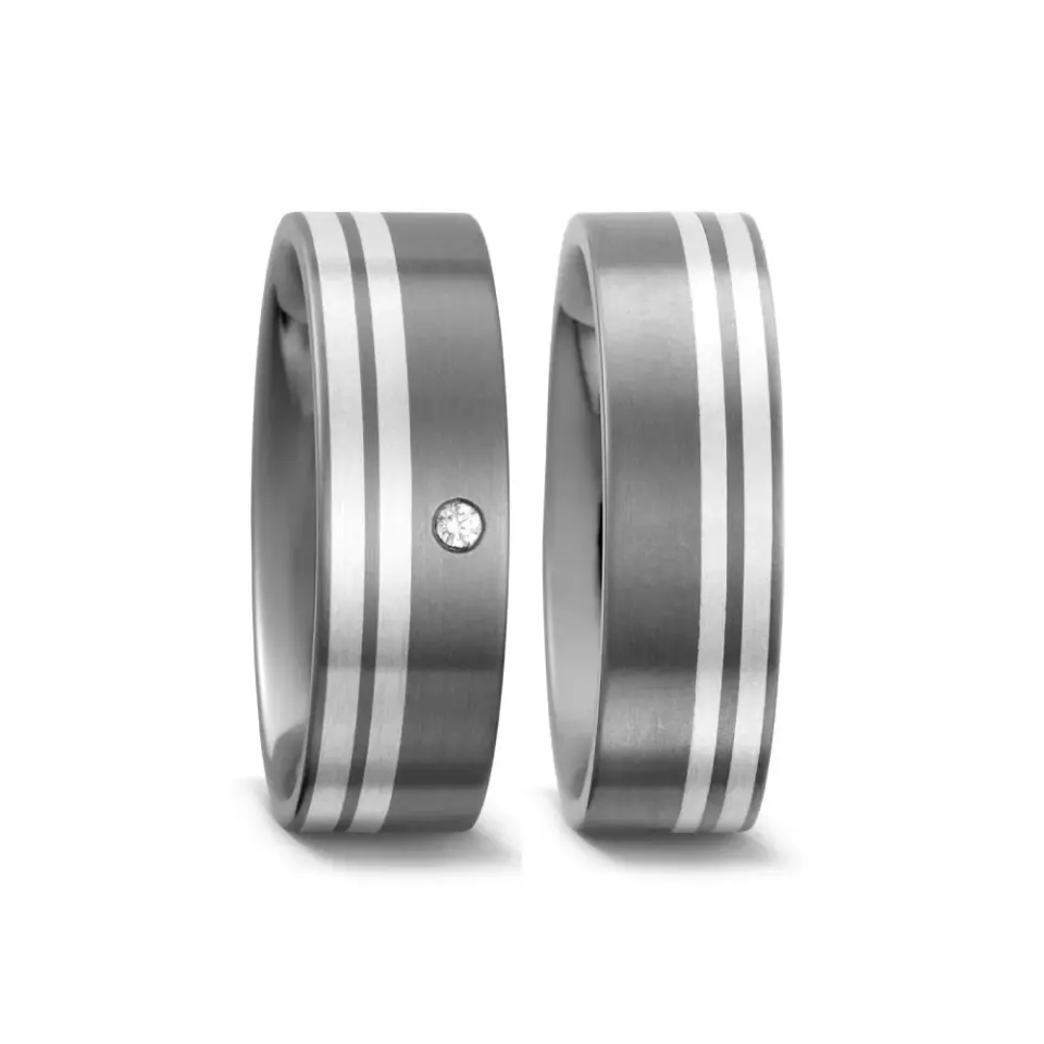 Alianzas de boda de titanio y plata con diamante