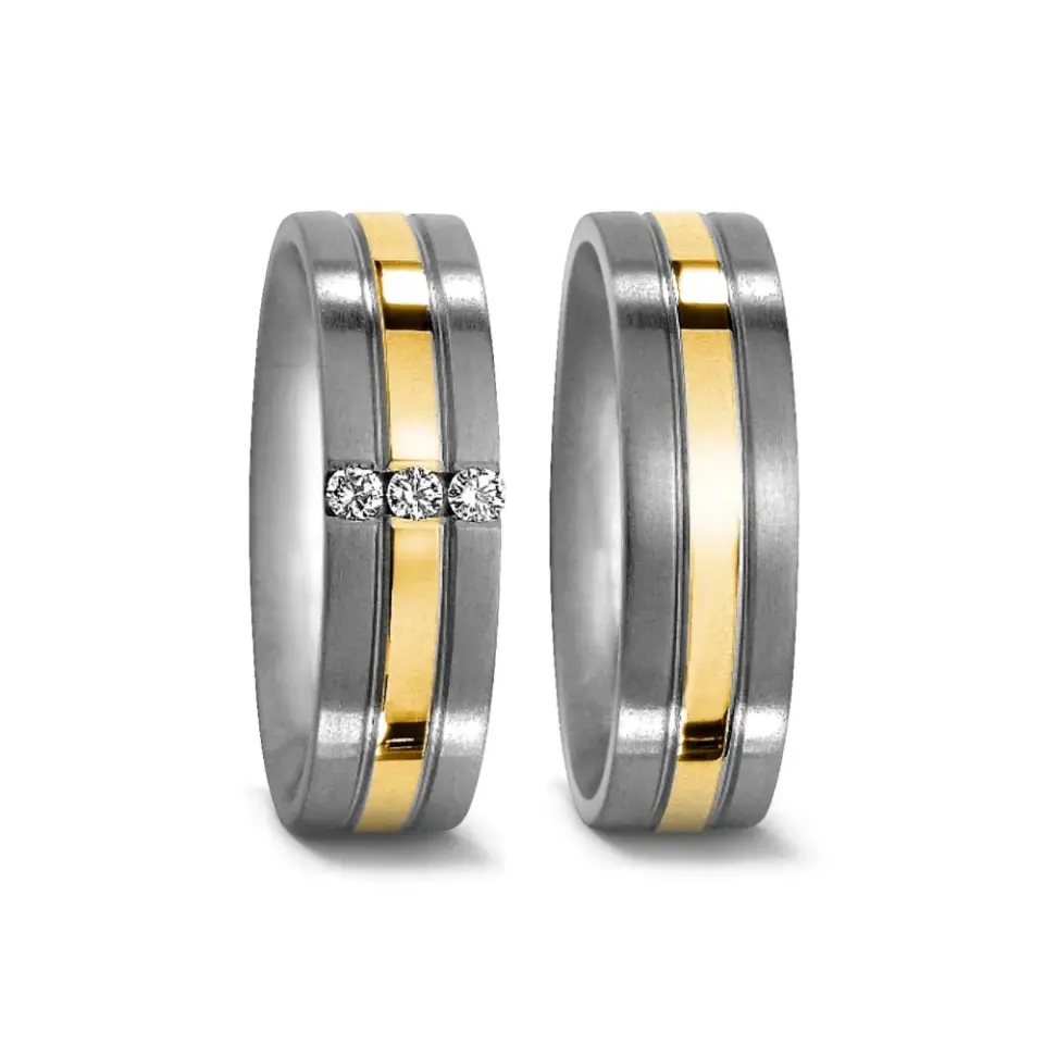 Alianzas de boda de titanio y oro amarillo con diamantes
