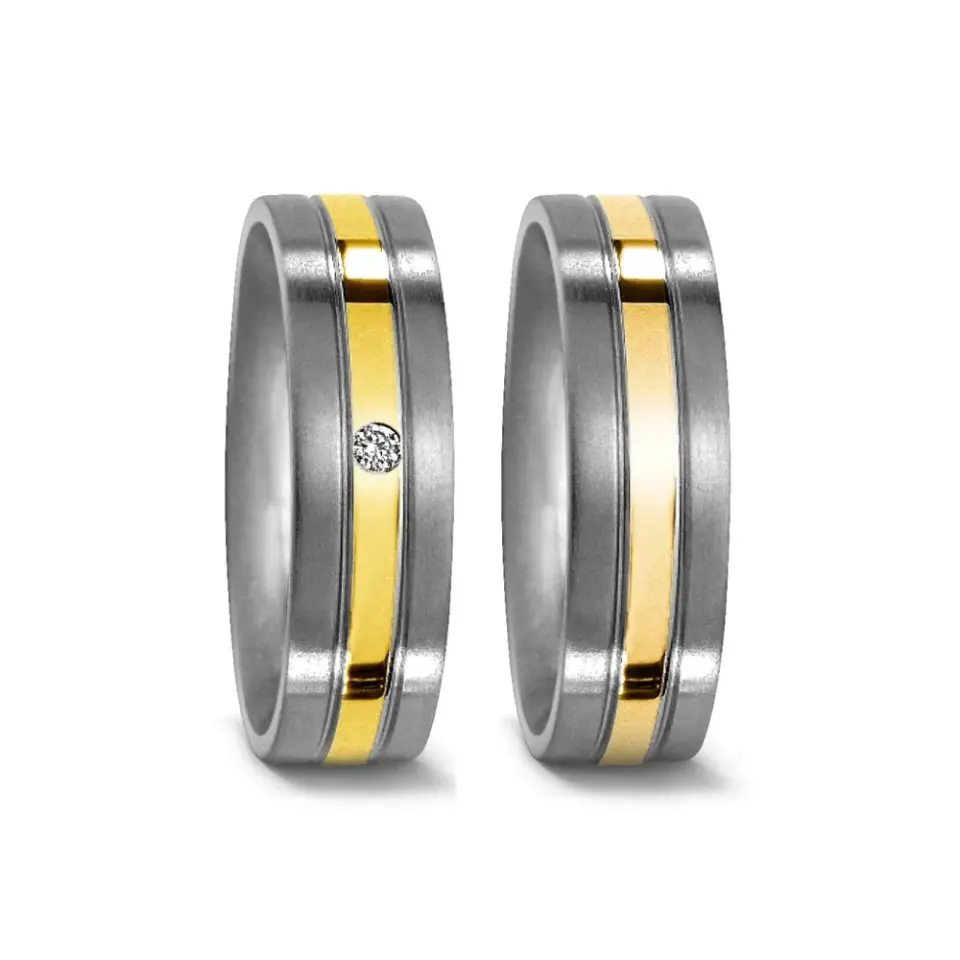 Alianzas de boda de titanio y oro amarillo con diamante