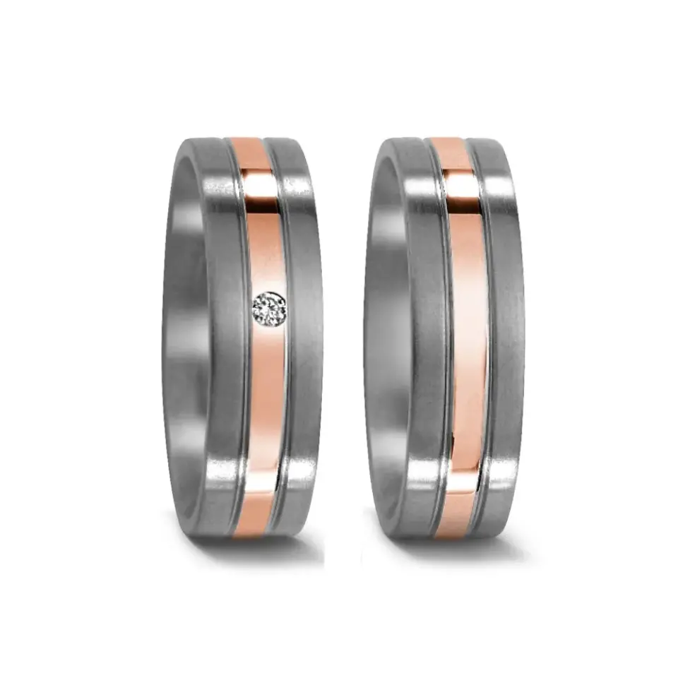 Alianzas de boda de titanio y oro rosado con diamante