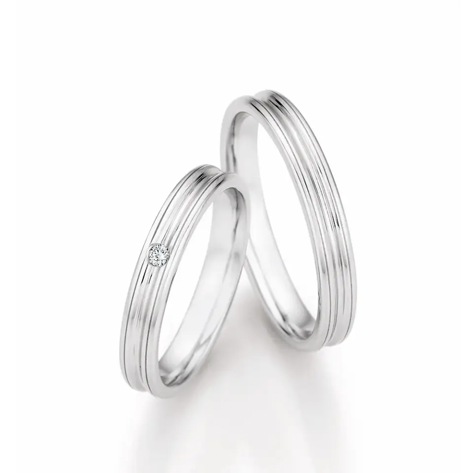 Alianzas de boda de platino con diamante