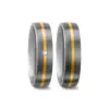 Alianzas de boda de titanio y oro amarillo con diamante