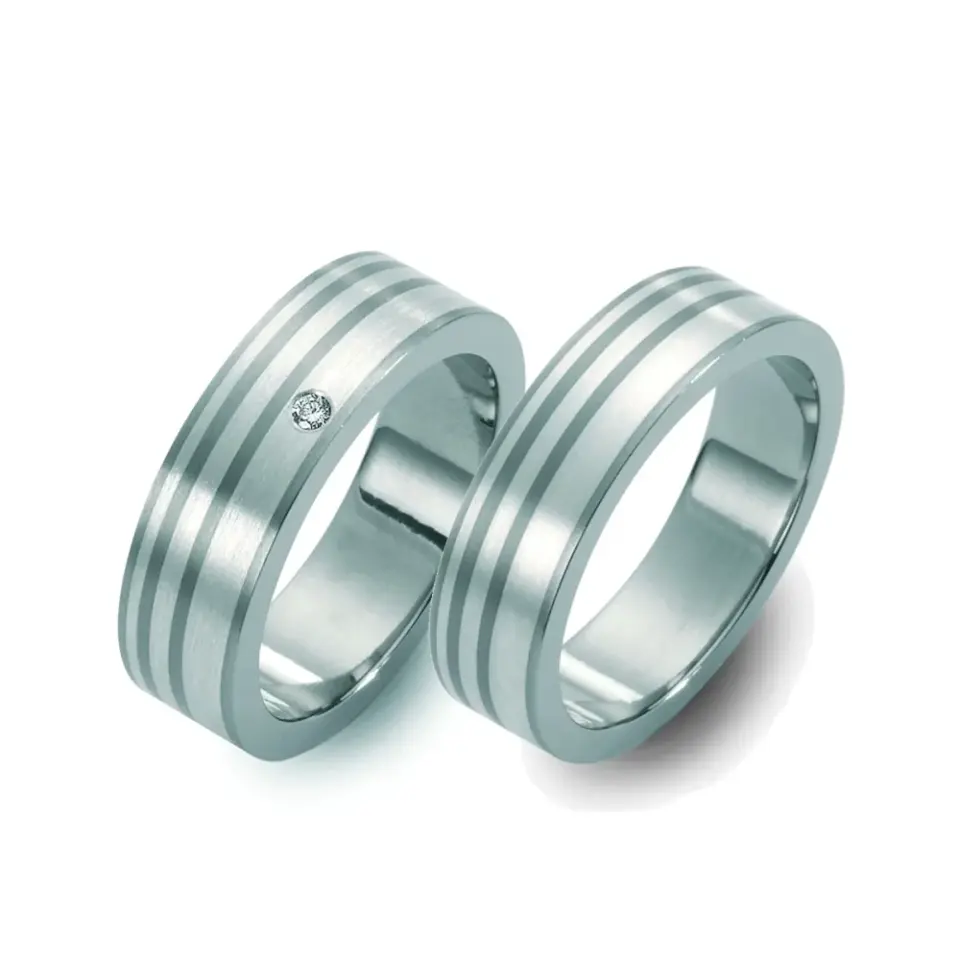 Alianzas de boda de titanio y platino con diamante