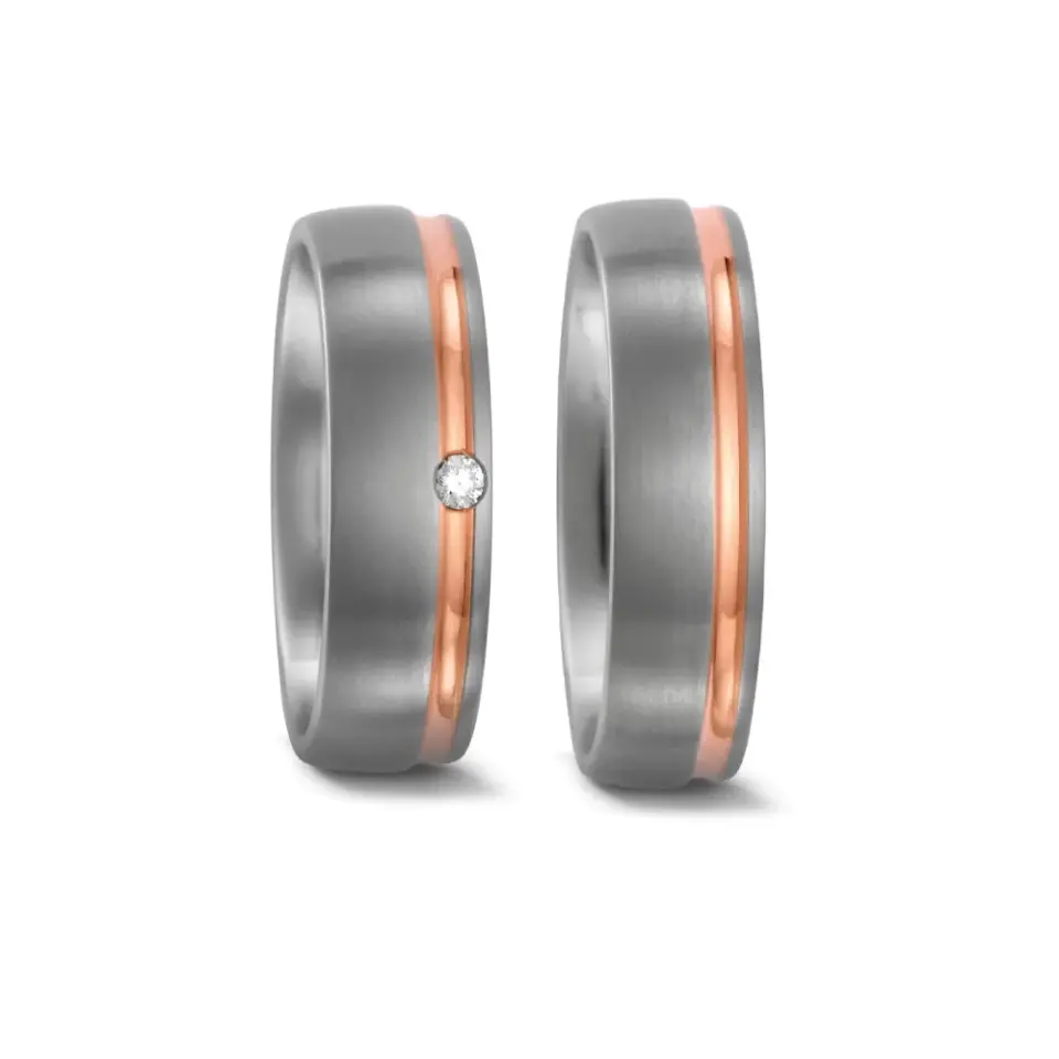 Alianzas de boda de titanio y oro rosado con diamante