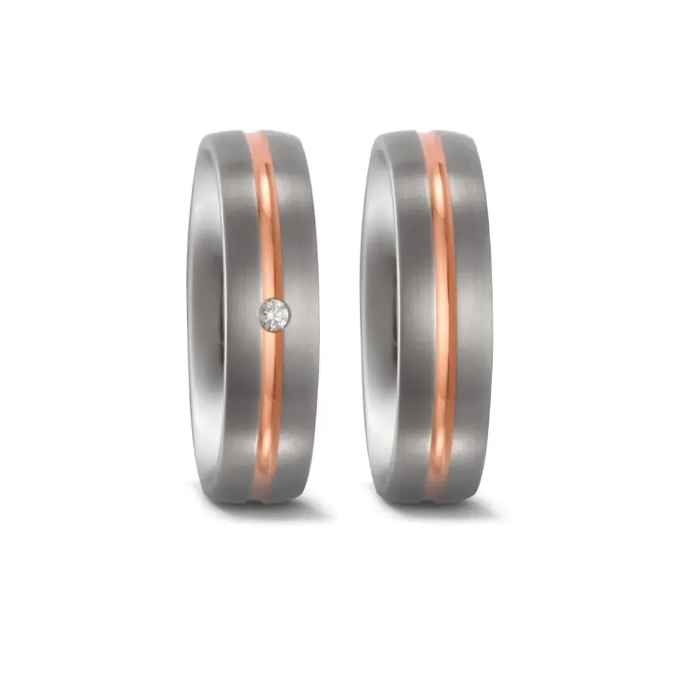 Alianzas de boda de titanio y oro rosado con diamante