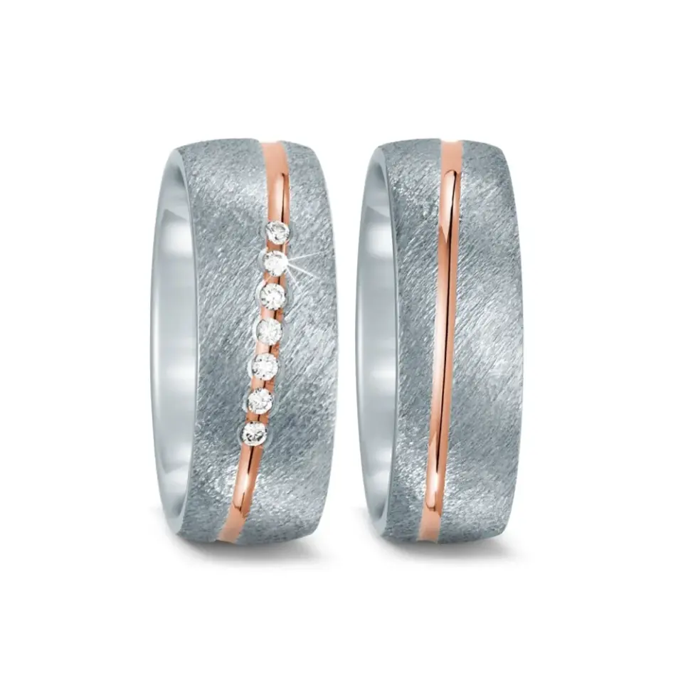 Alianzas de boda de titanio y oro rosado con diamantes