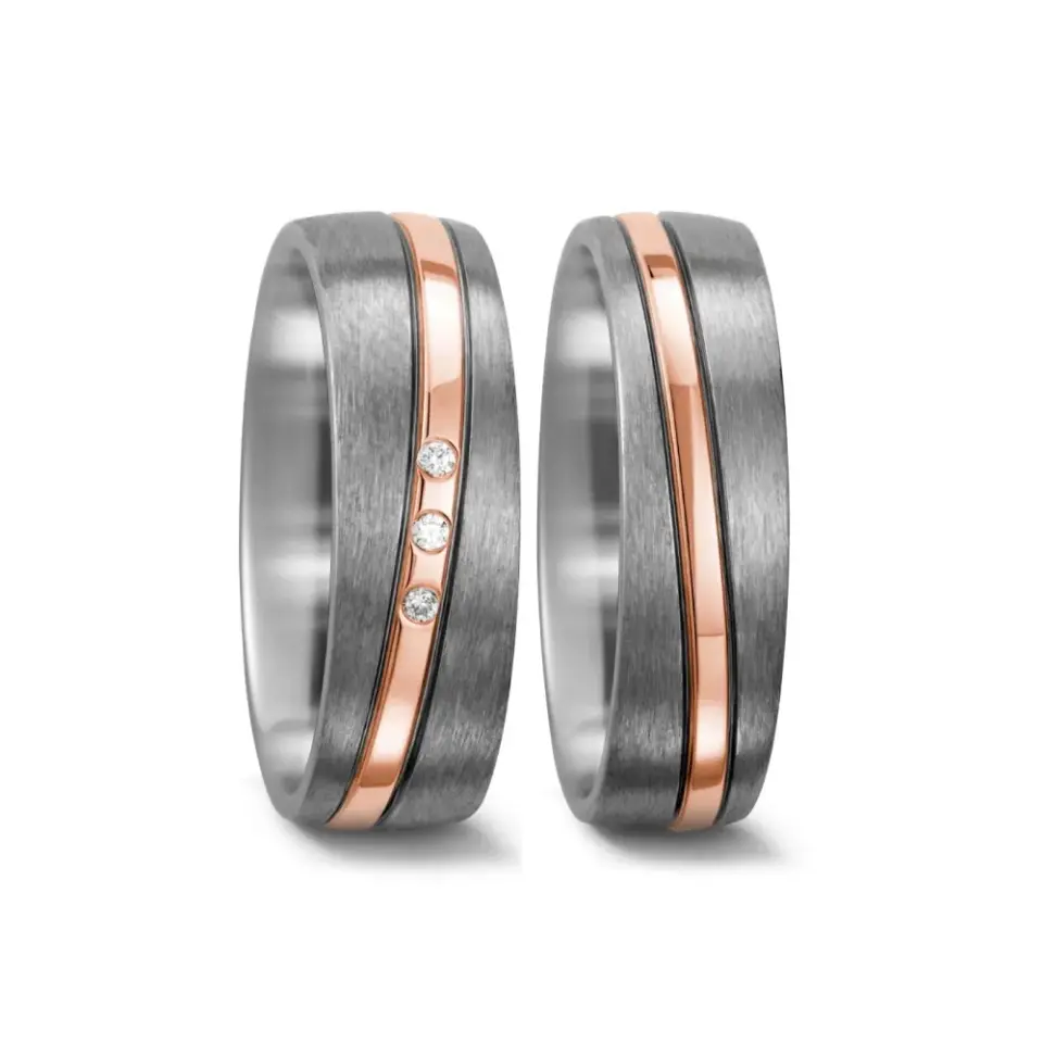 Alianzas de boda de titanio y oro rosado con diamantes