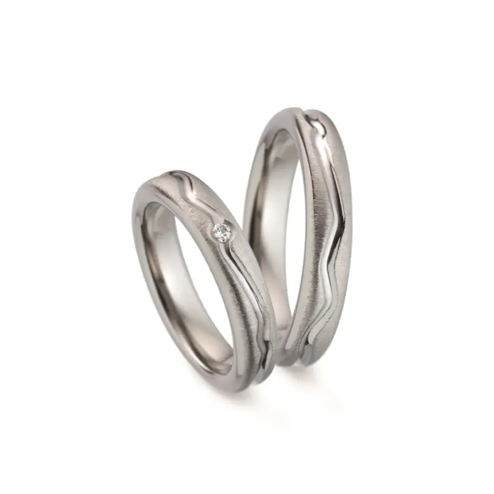 Alianzas de boda de titanio con diamante