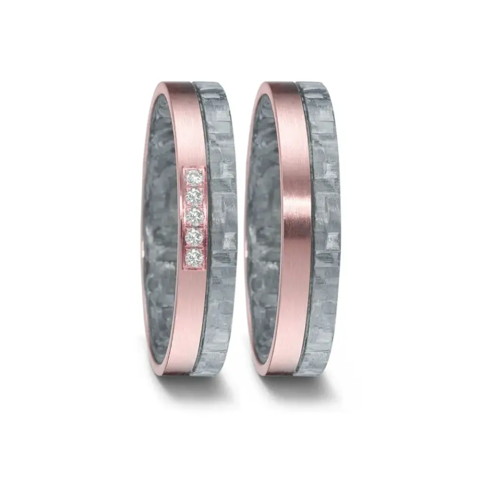 Alianzas de boda de carbono y oro rosado con diamantes