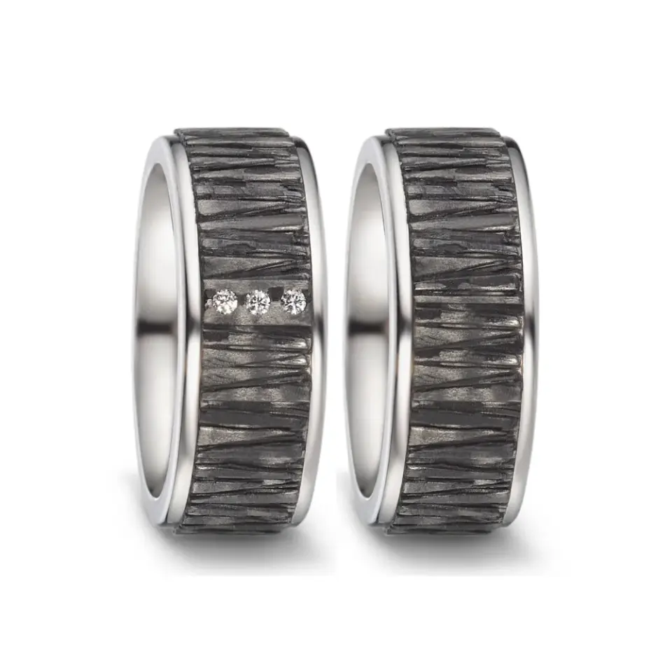 Alianzas de boda de titanio y carbono con diamantes
