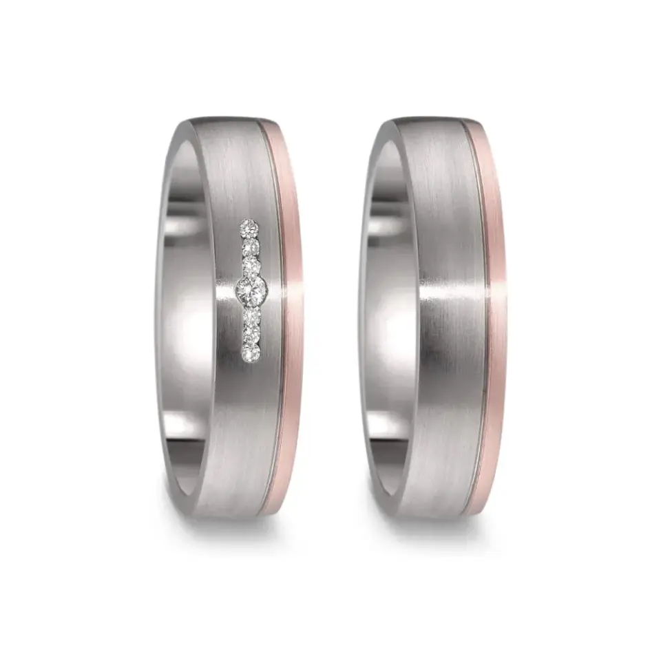 Alianzas de boda de titanio y oro rosado con diamantes