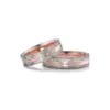 Alianzas de boda de carbono y oro rosado con diamantes