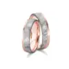 Alianzas de boda de carbono y oro rosado con diamante