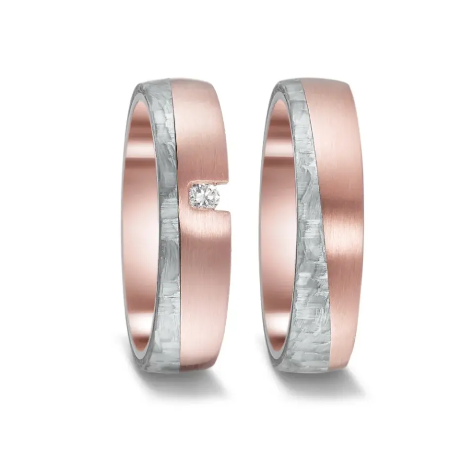 Alianzas de boda de carbono y oro rosado con diamante