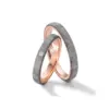 Alianzas de boda de carbono y oro rosado con diamante