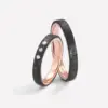Alianzas de boda de carbono y oro rosado con diamantes