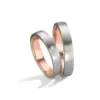 Alianzas de boda de acero y oro rosado con diamante