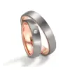 Alianzas de boda de titanio y oro rosado con diamante