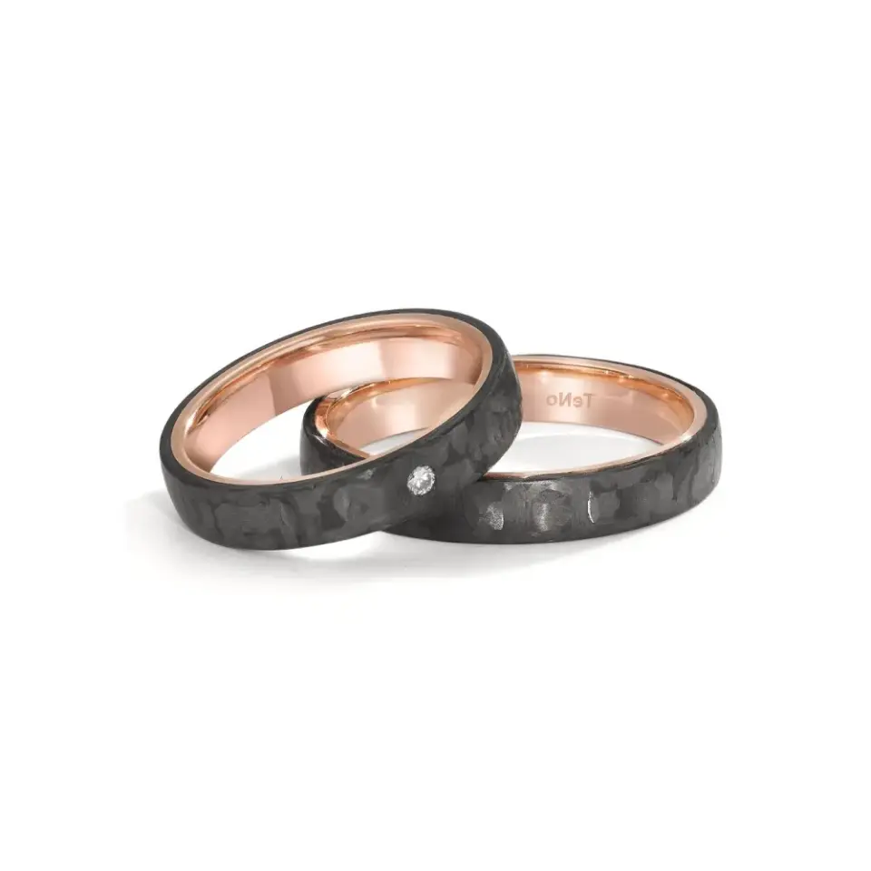 Alianzas de boda de carbono y oro rosado con diamante