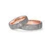 Alianzas de boda de carbono y oro rosado con diamante