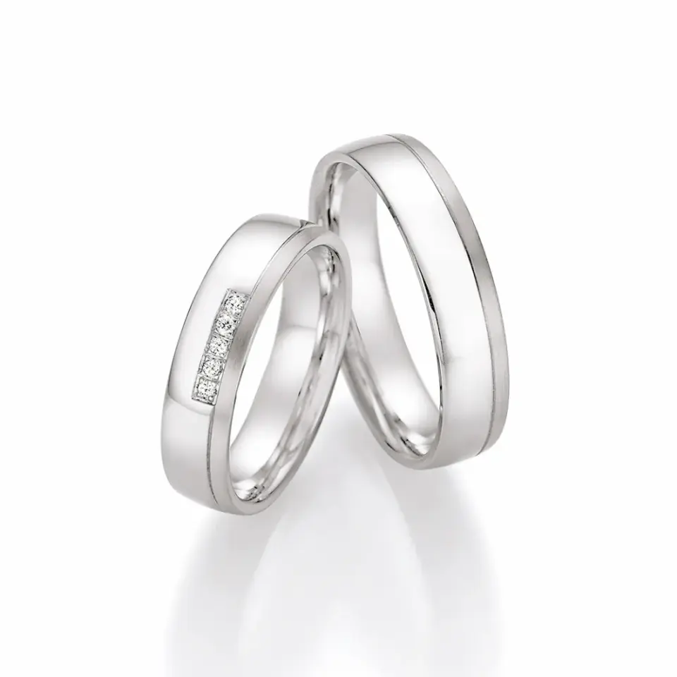 Alianzas de boda de plata con diamantes