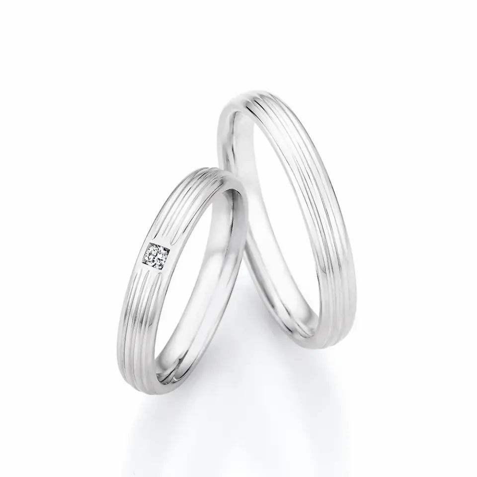 Alianzas de boda de plata con diamante