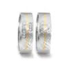 Alianzas de boda de acero y oro amarillo con diamantes