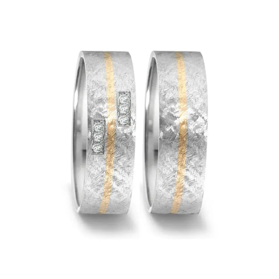 Alianzas de boda de acero y oro amarillo con diamantes