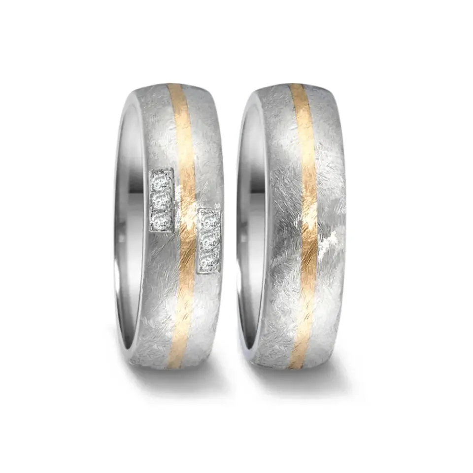Alianzas de boda de acero y oro amarillo con diamantes