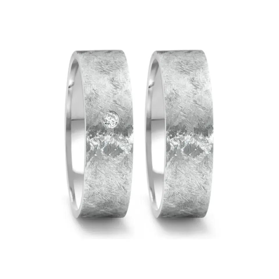 Alianzas de boda de acero con diamante